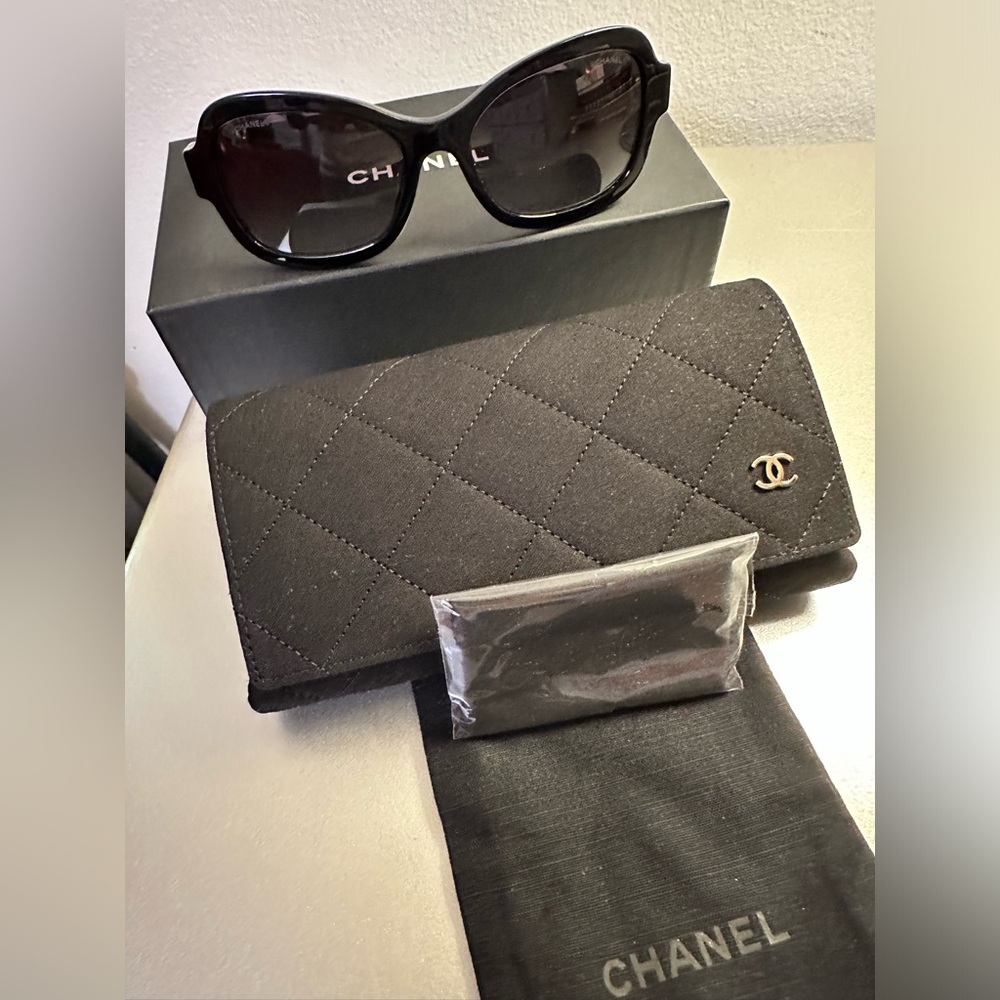 Authentic CHANEL sunglasses. Stylish & chic - with a black and gold trim.